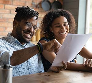 couple reviewing paperwork for 401k
