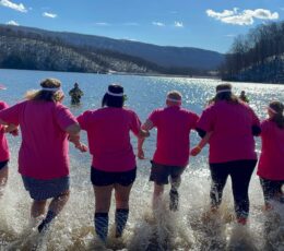 1st summit bank employees running into the lake for the polar plunge