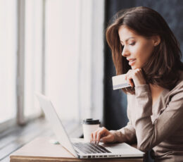 lady banking online with her credit card