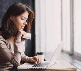lady banking online with her credit card